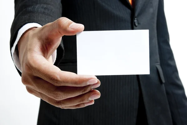 Business man holding blank note card — Stock Photo, Image