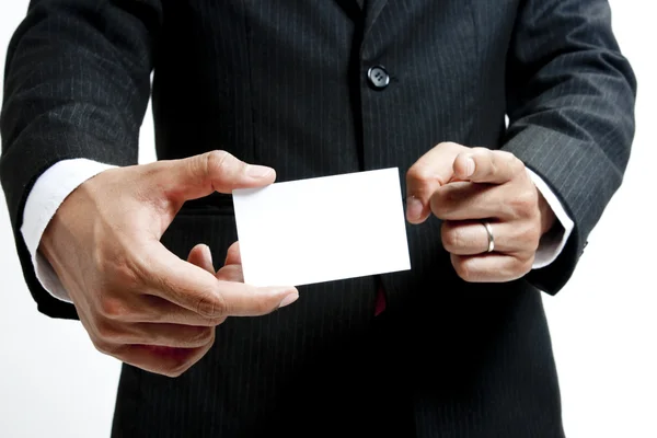 Hombre de negocios con tarjeta de nota en blanco — Foto de Stock