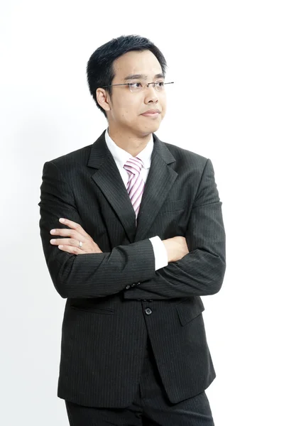 Uomo d'affari in piedi su sfondo bianco — Foto Stock
