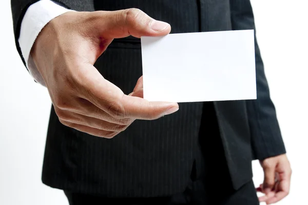 Business man holding blank note card — Stock Photo, Image