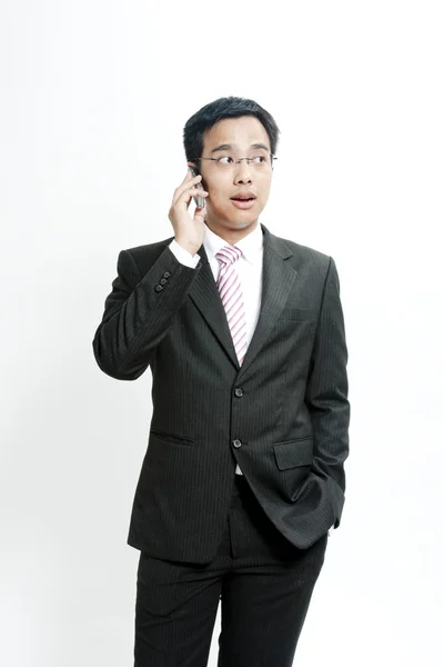 Businessman talking on cellphone — Stock Photo, Image