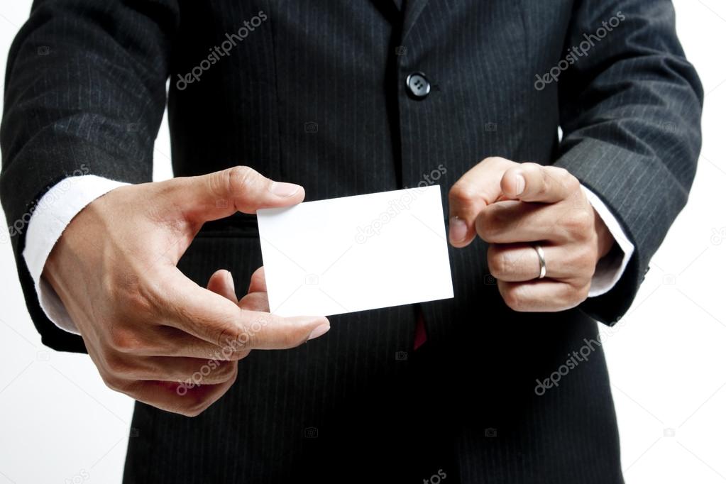 Business man holding blank note card
