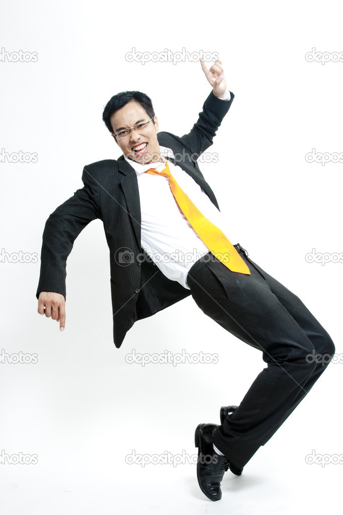 Portrait of a energetic young businessman enjoying success
