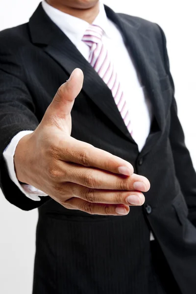 Вид бизнесмена, протягивающего руку, чтобы пожать — стоковое фото