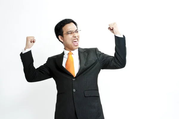 Retrato de um jovem empresário enérgico desfrutando de sucesso — Fotografia de Stock