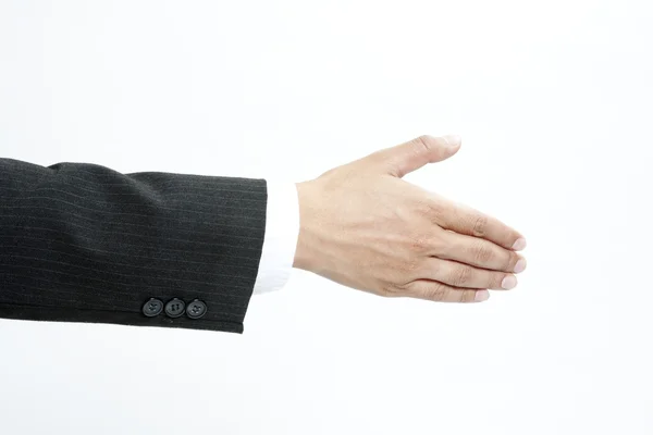 Vista del hombre de negocios extendiendo la mano para estrechar — Foto de Stock