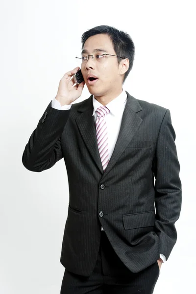 Businessman talking on cellphone — Stock Photo, Image