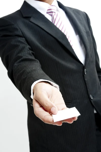 Business man holding blank note card — Stock Photo, Image