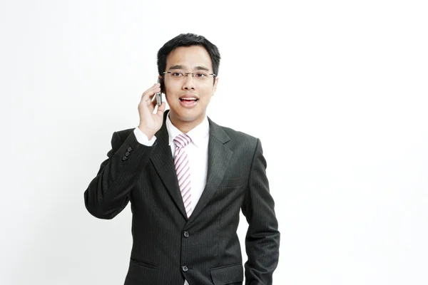 Businessman talking on cellphone — Stock Photo, Image