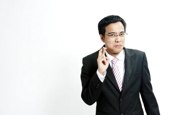 Supersticioso - empreendedor com dedos cruzados — Fotografia de Stock