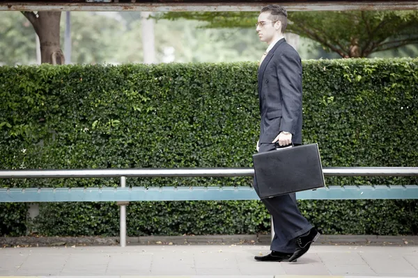 Businessman waiting for the bus — Stock Photo, Image