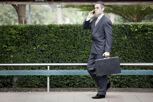 Businessman waiting for the bus — Stock Photo, Image