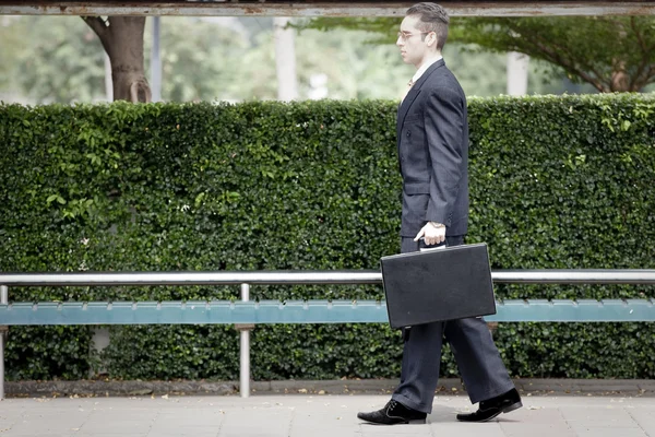 Businessman waiting for the bus — Stock Photo, Image