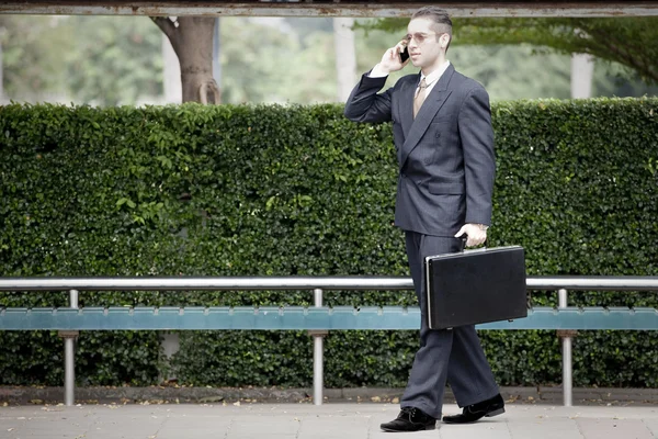 Businessman waiting for the bus — Stock Photo, Image