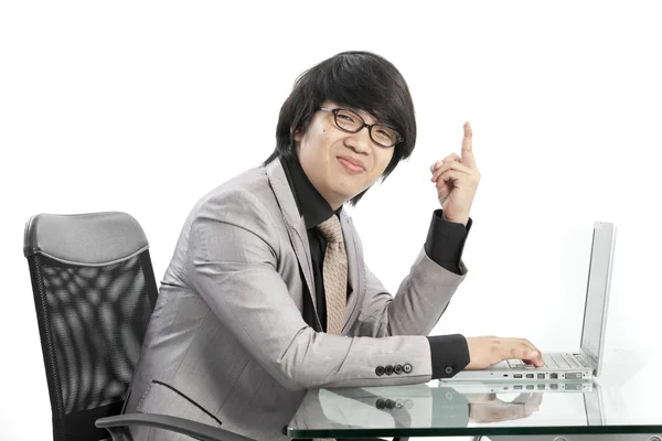 Young business man using new laptop and thinking — Stock Photo, Image