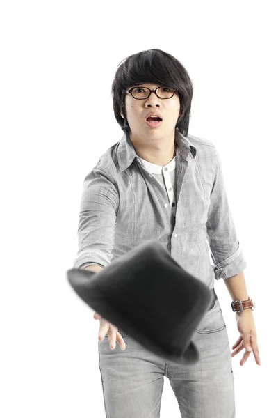 Asian Man wearing casual outfit throwing hat — Stock Photo, Image