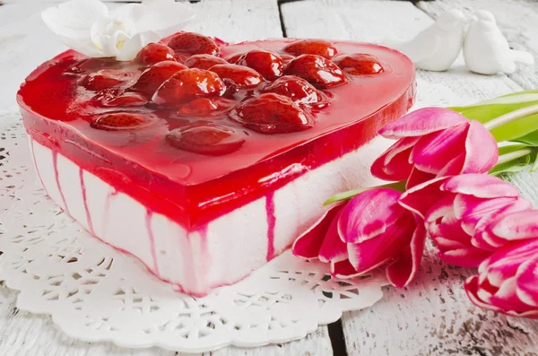 Beautiful cake in the shape of hearts and tulips — Stock Photo, Image