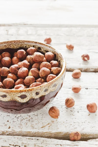 Hazelnuts in a bowl — Stock Photo, Image