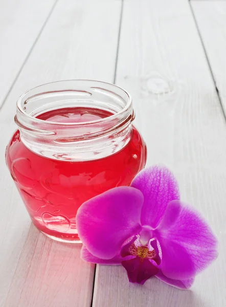 Jam and orchid — Stock Photo, Image