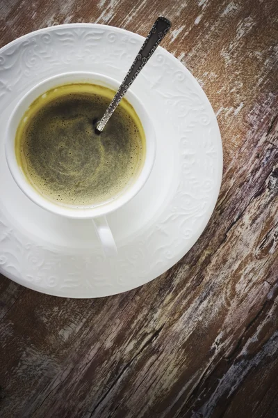Tazza di caffè su un bel piatto — Foto Stock