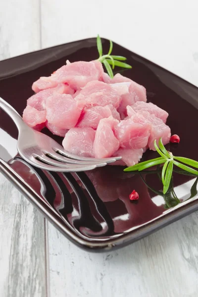 Raw meat and  rosemary — Stock Photo, Image