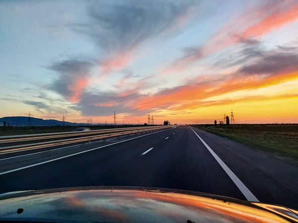 View Car Windshield Beautiful Sunset Large Highway Traveling Car Beautiful — Fotografia de Stock