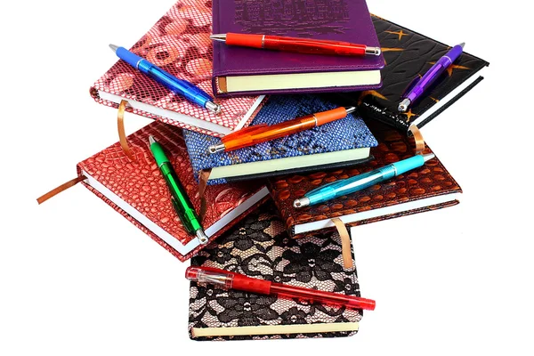 Notebooks and pens to choose from — Stock Photo, Image