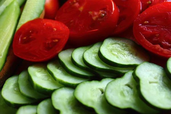 Sliced ??cucumbers and tomatoes — Stock Photo, Image