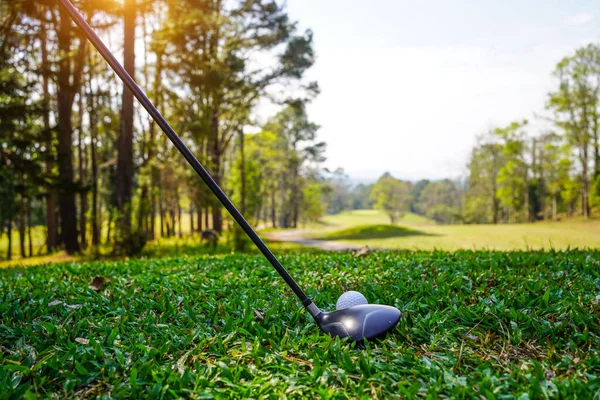 Golf balls on the golf course with golf clubs ready for golf in the first short. In the morning, with the beautiful sunlight.