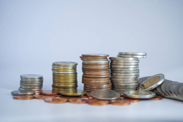 Coin thai bath on white background. Coins and currency of Thailand on the white background.                                