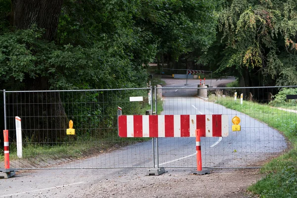 Narrow Forest Road Bridge Closed Red White Sign Wire Fence — Stok fotoğraf