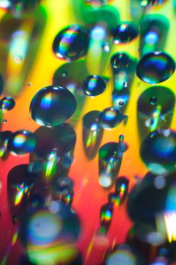 Abstract close-up colorful blob texture background. Drop macro background.