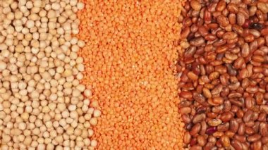 Nohut, fasulye ve portakallı mercimeğin protein tohumlarının besin arkaplanı.