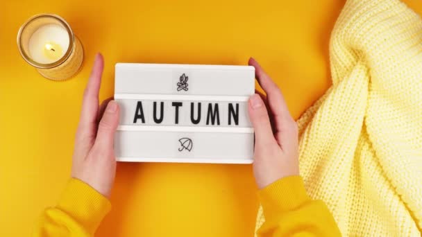 Hands Young Girl Hold White Board Inscription Autumn Pattern Bonfire — Stock Video