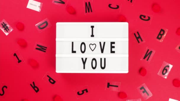Inscription Love You White Board Red Background Random Letters Increases — Stockvideo