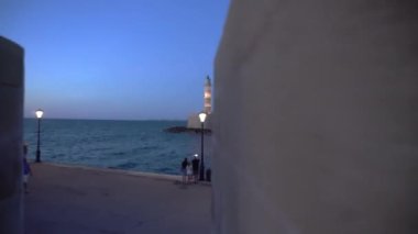 Lighthouse emerging from fort wall
