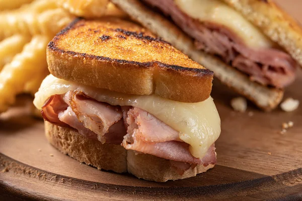 Closeup Grilled Ham Cheese Sandwich Cut Half French Fries Wooden — Stock Photo, Image