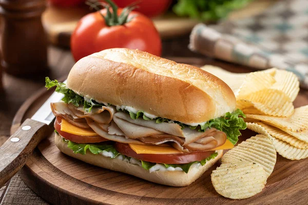 Sandwich Made Turkey Lettuce Cheese Tomato Bun Tomatoes Lettuce Background — Fotografia de Stock