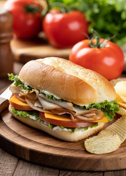 Sandwich Made Turkey Lettuce Cheese Tomato Bun Tomatoes Lettuce Background — Foto de Stock