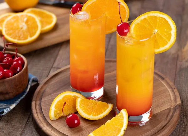 Tequila Sunrise Cocktail Orange Slice Cherry Rustic Wooden Table — Zdjęcie stockowe