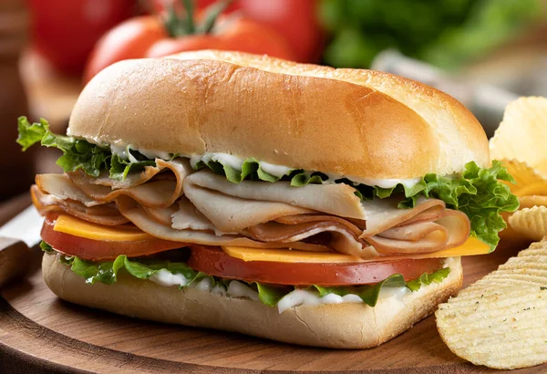 Submarine Sandwich Made Turkey Cheese Lettuce Tomato Mayonnaise Potato Chips — Photo