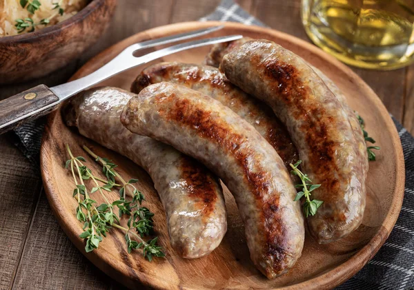 Fried Bratwurst Garnished Thyme Plate Rustic Wooden Table — Stock Fotó