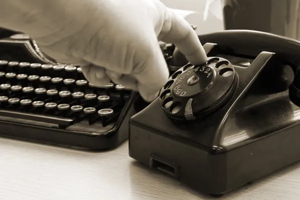 Vintage typewriter and phone — Stock Photo, Image