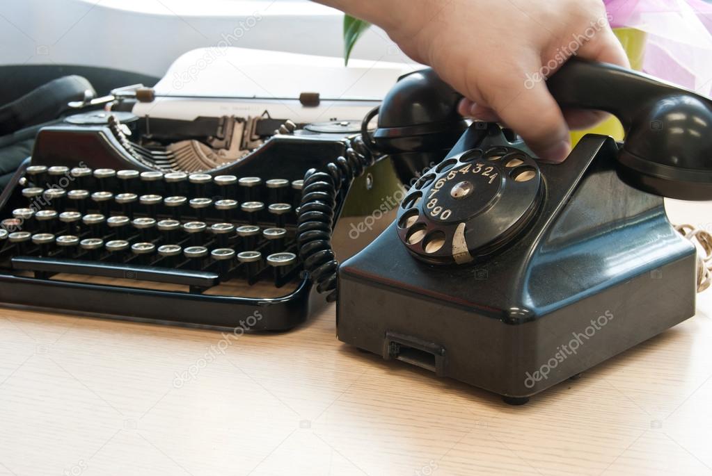 Vintage phone and typewriter