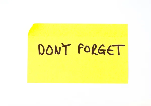 'Don't Forget' written on a sticky note — Stock Photo, Image