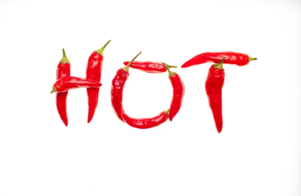 'Hot' spelt with chilli peppers — Stock Photo, Image
