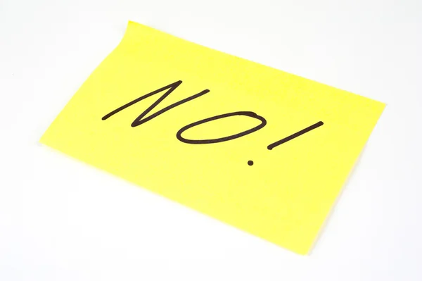 'Não' escrito numa nota amarela pegajosa — Fotografia de Stock