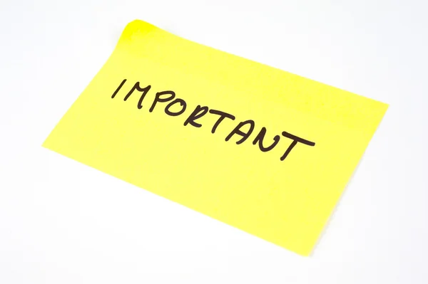 'Important' written on a yellow sticky note — Stock Photo, Image