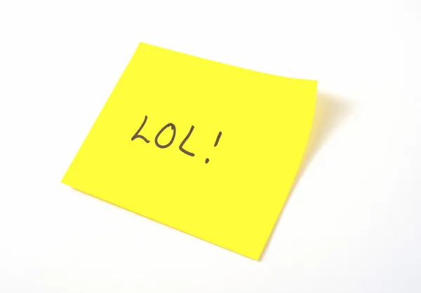 'LOL 'écrit sur une note jaune collante — Photo