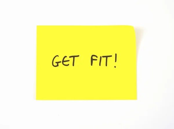 'Get Fit' escrito en una nota adhesiva amarilla — Foto de Stock